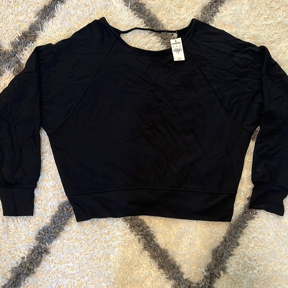Express, open back, light weight sweatshirt in black.